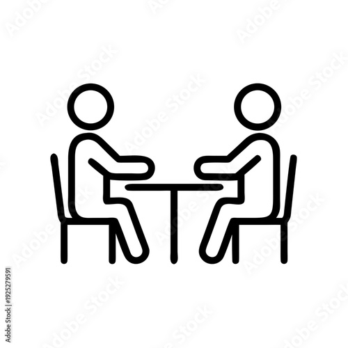 Two People Seated at Small Table Icon — Business Discussion and Team Meeting Symbol