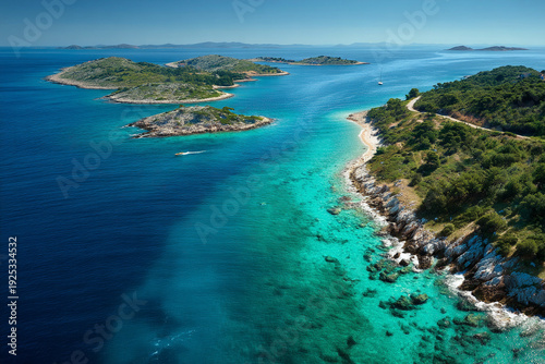 A turquoise Adriatic coastline viewed from above, showing the untouched Croatian islands scattered in the distance.