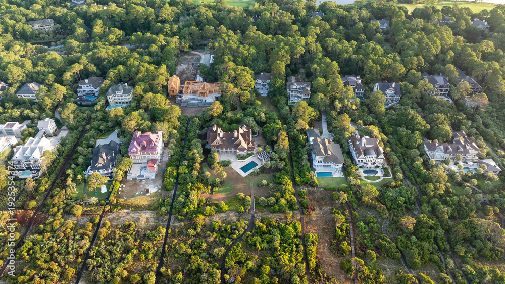 Fototapeta premium Panoramic Aerial view of beachfront mansion homes along Kiawah Island landscapes near Charleston, South Carolina showcasing the lowcountry coast and natural beauty