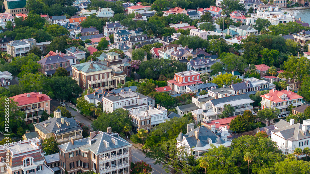 Naklejka premium Aerial view of Charleston, South Carolina cityscape skyline showing lowcountry landscapes and south of broad neighborhood with historic homes and mansions