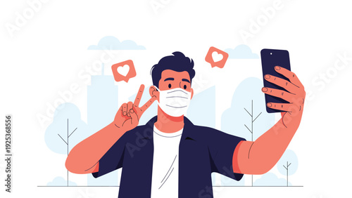 Young man wearing protective face mask taking selfie with smartphone and showing peace sign in urban park environment.