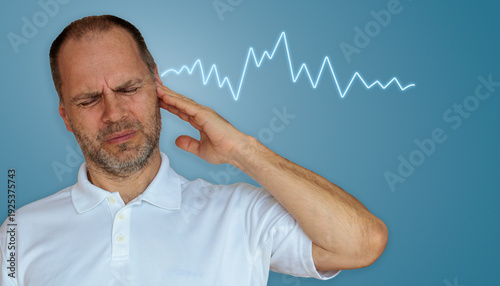 Photos Man suffering from tinnitus or noise sensitivity as glowing audio waveform appears near his ear