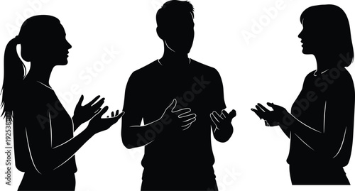 Silhouette of three people engaged in an active conversation and discussion group representing teamwork communication and social interaction in business meeting