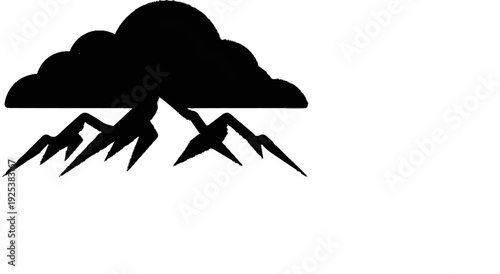 Black silhouette of storm clouds over jagged mountain peaks