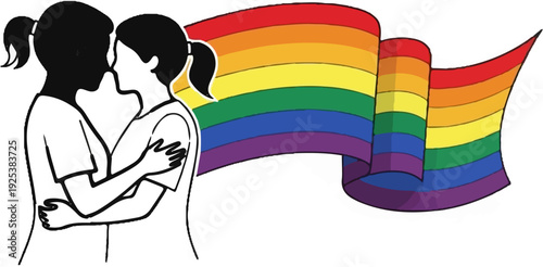 Two people embrace in front of a colorful rainbow flag