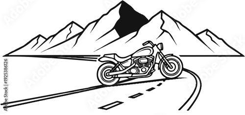 Motorcycle speeding on a winding road through mountains