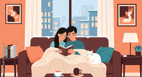 Happy couple relaxes on a sofa under a warm blanket while reading a book together in a cozy living room during a snowy winter day outside.