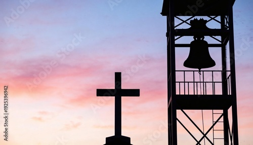 Bell Tower and Cross Silhouette at Dawn