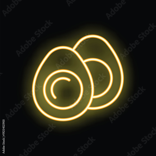 Yellow neon icon of two whole eggs glowing on black background