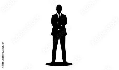 Silhouette of Authority: A sharply-dressed silhouette of a man stands confidently, radiating power and focus in a minimalist monochrome composition.
