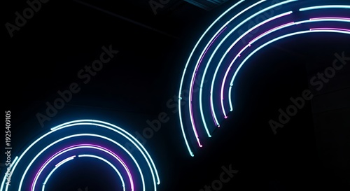 Light trails in the darkness forming circular patterns