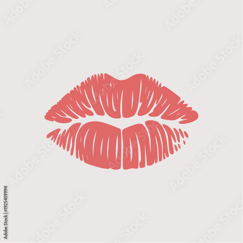 Red lipstick kiss mark on white background.