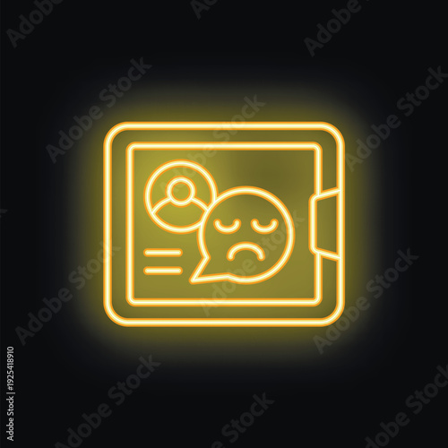 Yellow neon icon of a tablet with a sad emoji in a speech bubble, conveying online negativity