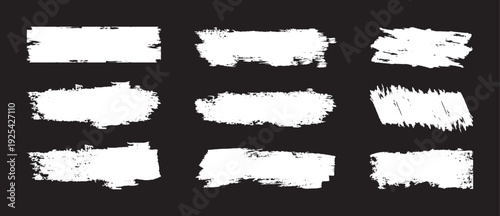 Set of hand painted chalk brushes. White grunge brush strokes. Vector chalk grunge hand drawn banners isolated on chalkboard bg. Paint roller, urban ink splash brushstrokes. Vector illustration,