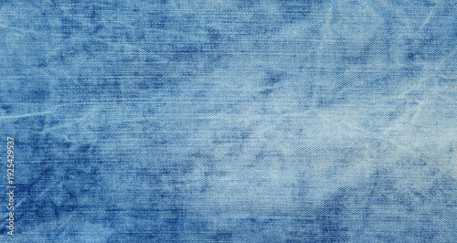 Washed blue denim fabric texture background