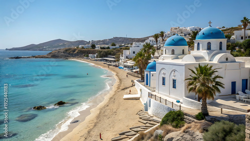 Greece beach scene with white and blue church and palm trees by turquoise sea on sunny day with clear blue sky