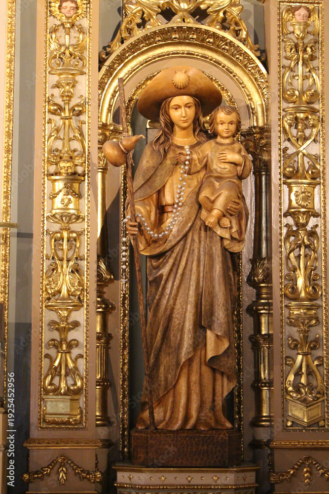 Fototapeta premium Statues of Jesus Mary and Santiago Apostol inside Capilla das Animas August 2024