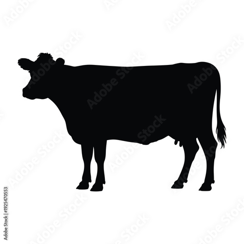 Black silhouette of a cow standing in a profile view