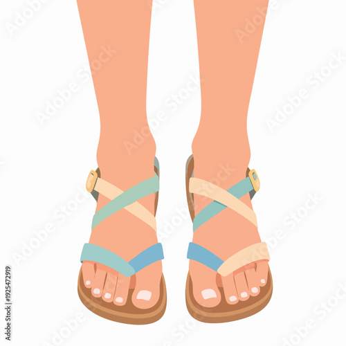 A pair of feet wearing strappy sandals with painted toenails viewed from the front