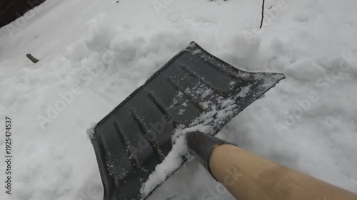 White Worker Clearing Roof Snow, Large Plastic Shovel Removing Heavy Wet Snow From Roof Edge, Brick Chimney,