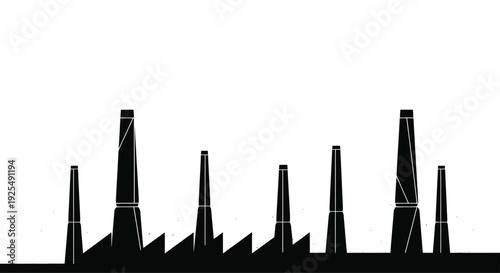 Industrial chimneys along a coastline silhouette