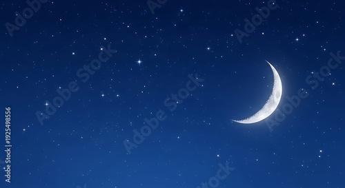 Crescent Moon and Stars in a Deep Blue Night Sky image