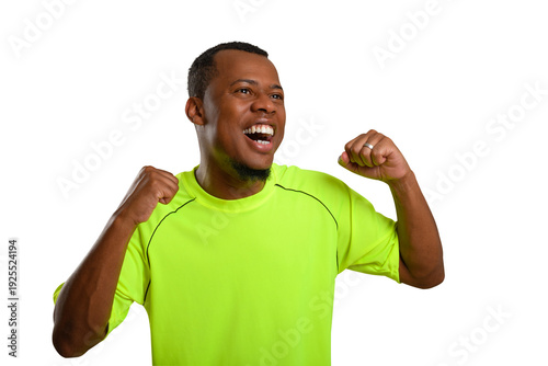 Foto Fan cheering while wearing a neon green shirt.
