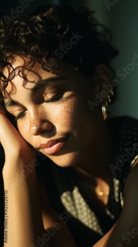Confident woman portrait in warm natural window light