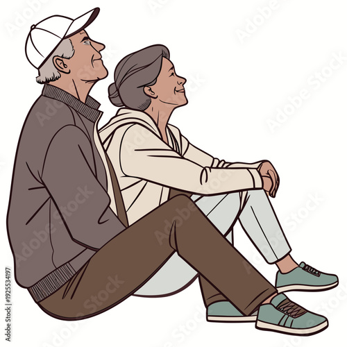 An elderly couple sitting together on the floor