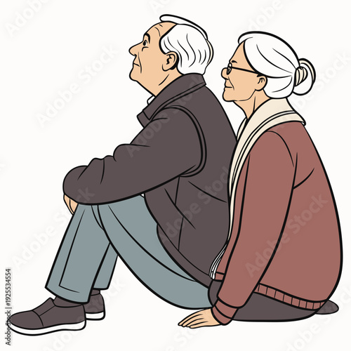 Elderly couple sitting on the floor in a relaxed pose