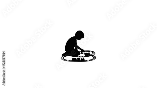 Child Playing with a Toy Train
