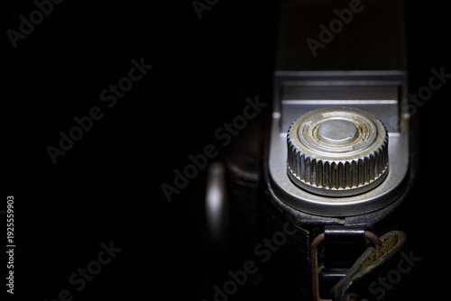 Vintage film 35mm camera on black and white