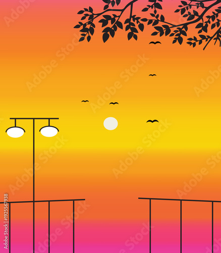 Beautiful sunset over the sea with bird silhouettes. Evening park view with street lights and tree branches.