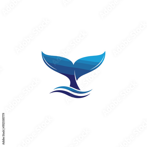 Blue whale tail emerging from ocean waves