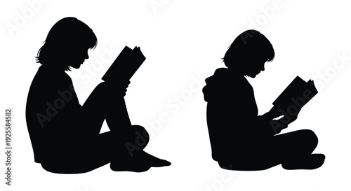 Two children absorbed in reading a striking black silhouette