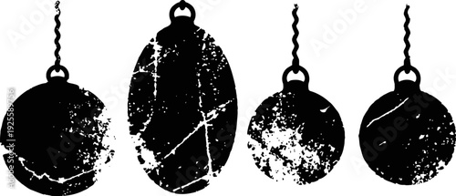 Silhouettes of four vintage round pendulum weights hanging on chains isolated on white background