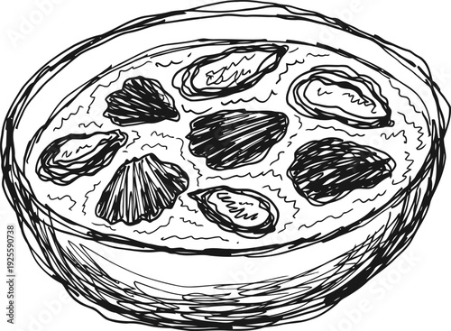 Bowl of creamy seafood chowder with mussels and clams ready to serve