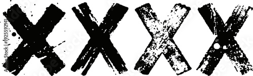 set of four black grunge x marks, distressed textured crosses with paint splatter and rough brush strokes