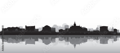 Black and white panoramic poster of the city skyline with misty background buildings and water reflection of KRAKOW, POLAND