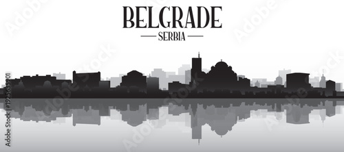 Black and white panoramic poster of the city skyline with misty background buildings and water reflection of BELGRADE, SERBIA