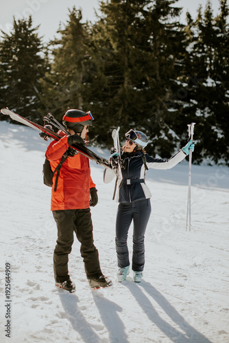 Couple enjoys skiing togeth...
