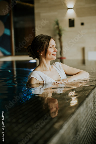 Woman enjoys time in indoor...