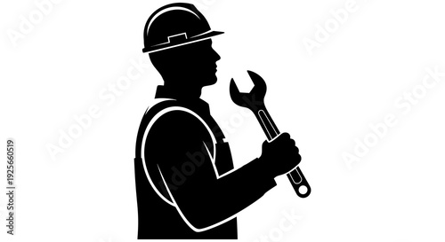Silhouette of a construction worker holding a wrench in a side profile view high quality professional