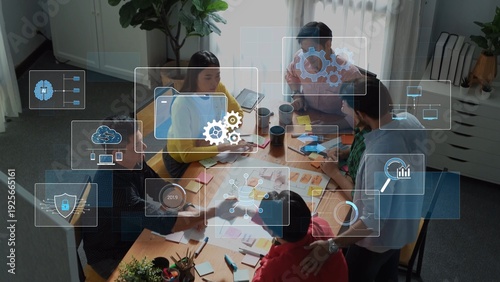 Tableau sur toile A diverse team collaborates in a modern office during a brainstorming session, utilizing technology overlays to visualize ideas and strategies for innovation and growth