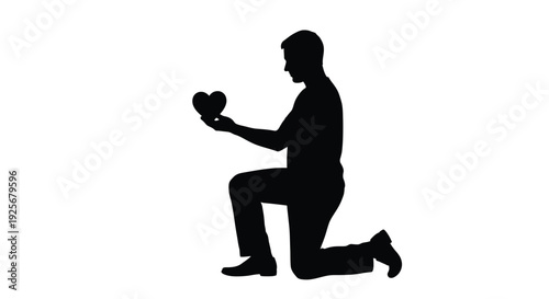 A man proposing with a heart captured in a striking silhouette