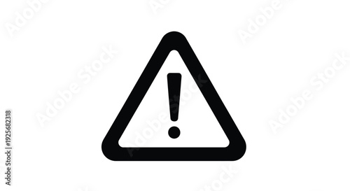 Black triangle warning sign with exclamation point a stark silhouette