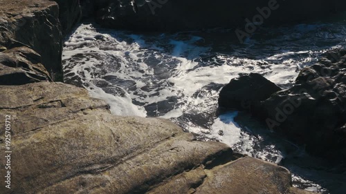Waves hit the rock at Cape Inamuragasaki, Kamakura, Japan.