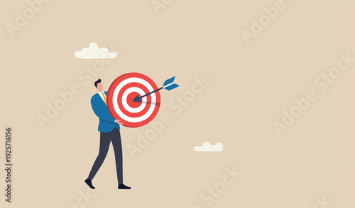Business target, aiming high goal, objective or purpose, skill aspiration to achieve target, precision or accuracy concept, success businessman holding big target arrow hit bullseye center.