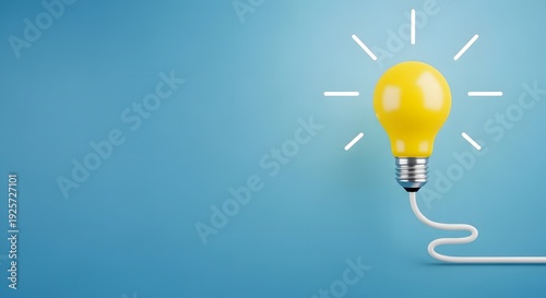 A bright yellow light bulb with glowing effect on blue background