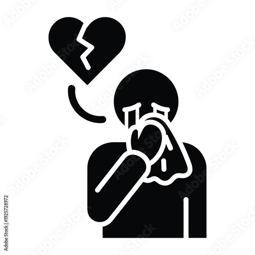 Silhouette of a person weeping into a handkerchief with a cracked heart icon above